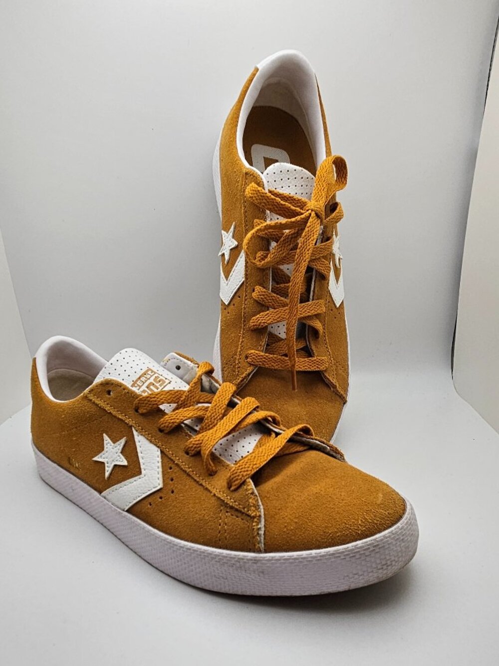 Converse Women’s Suede Low-Top Sneakers in Mustard Yellow and White